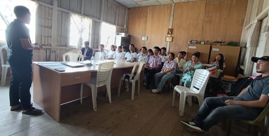 Participants of the workshop listen to the resource person.